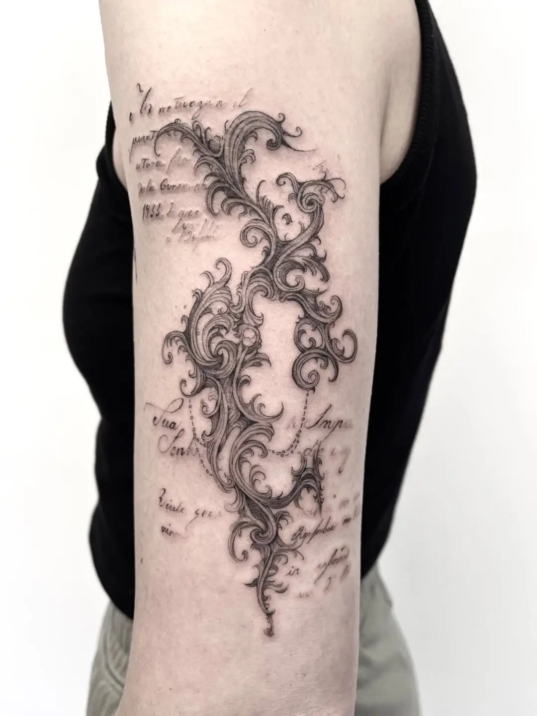 Intricate tattoo blending art with calligraphy