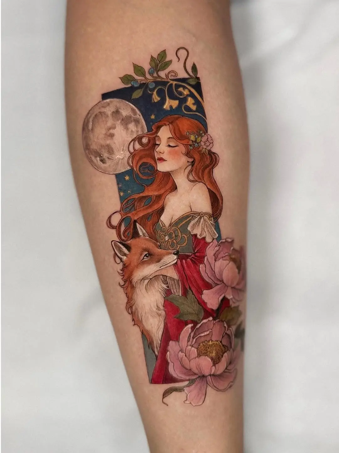 Captivating ethereal tattoo with moon and fox