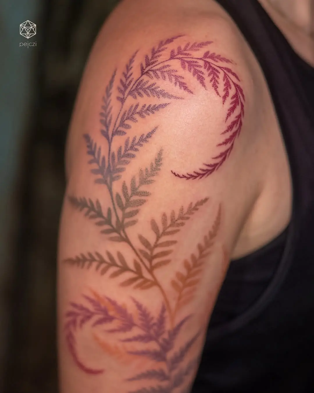 Vibrant fern leaf tattoo showcasing natural elegance
