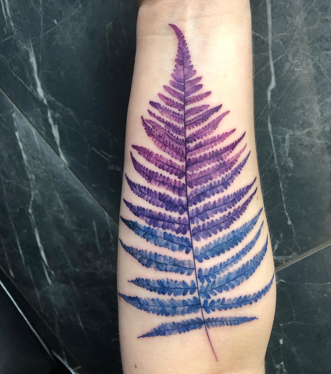 Stunning fern leaf tattoo with gradient shades