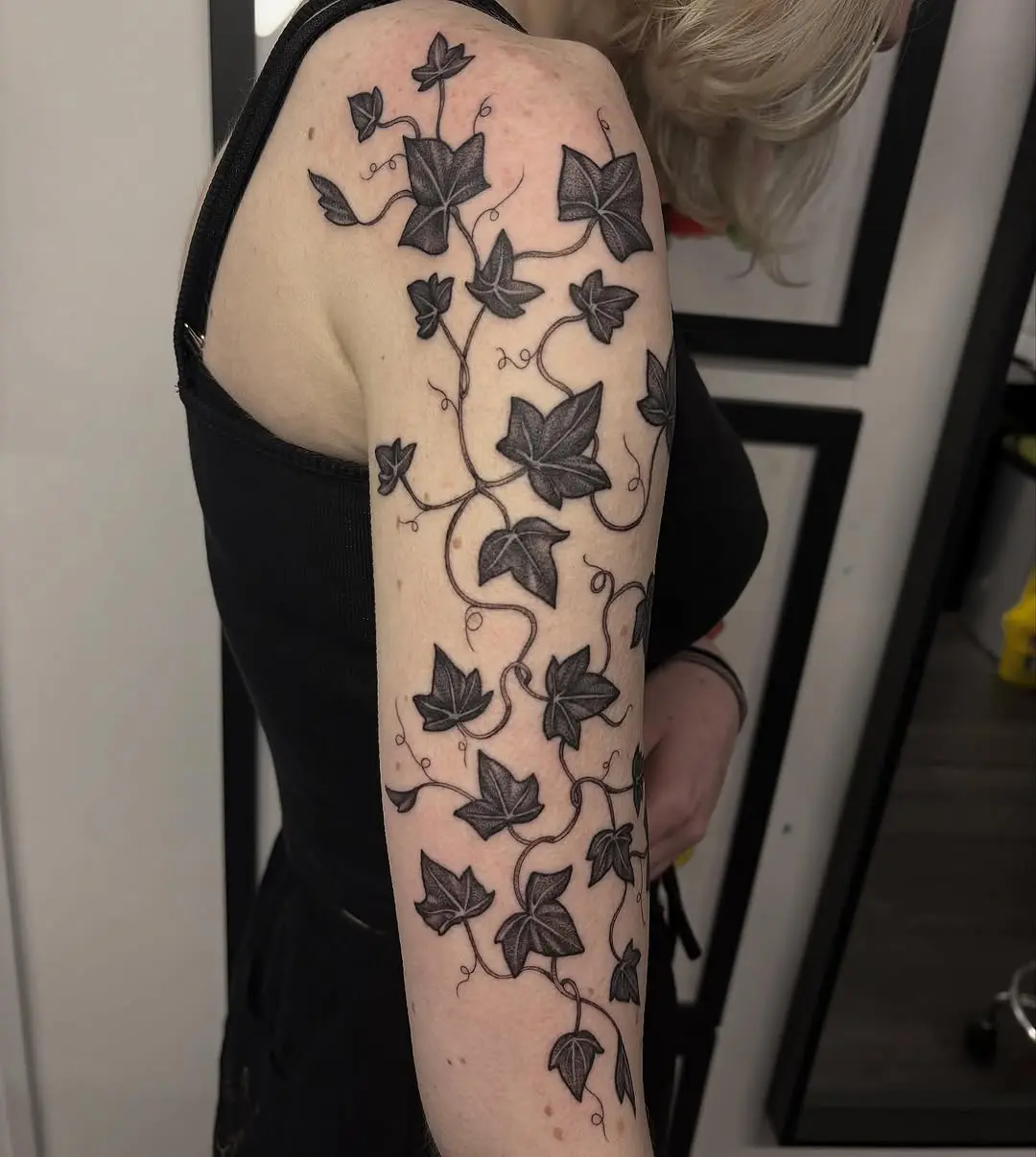 Elegant Ivy Tattoo Sprouting Along the Arm