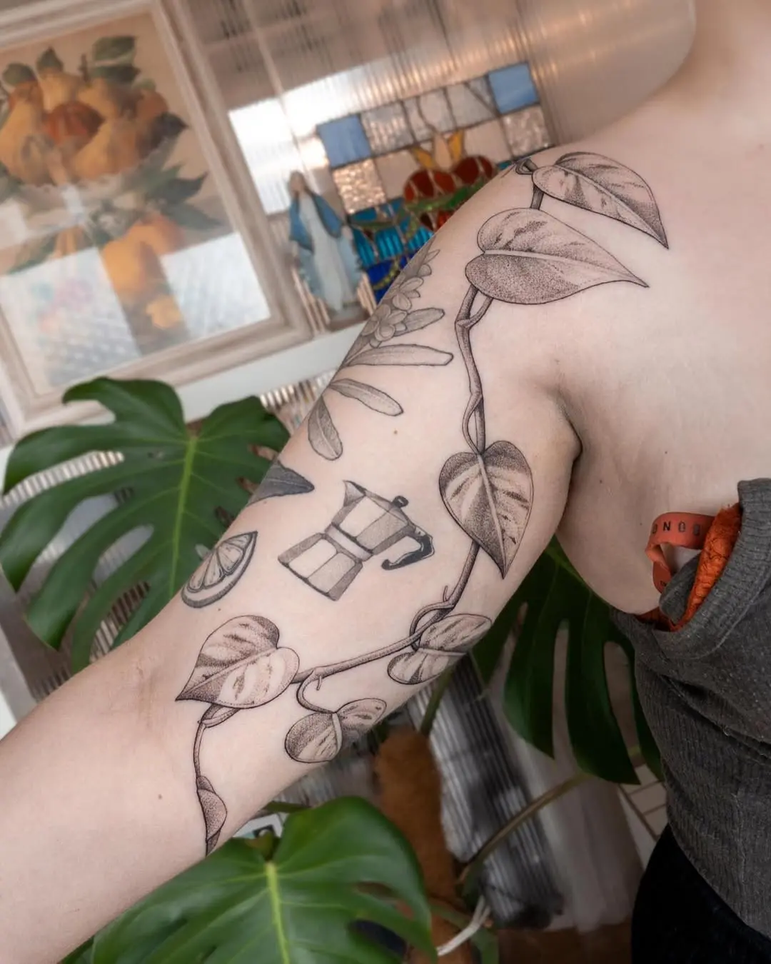 Elegant Ivy Tattoo Design on Arm