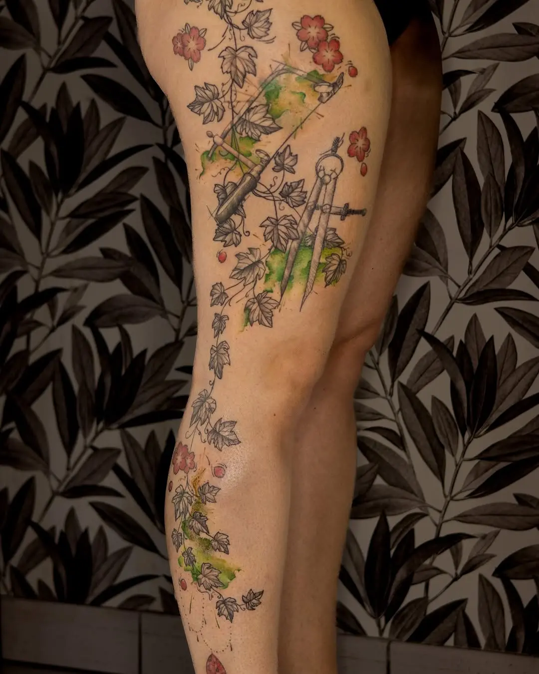 Vibrant Ivy and Flowers in Stunning Tattoo Design