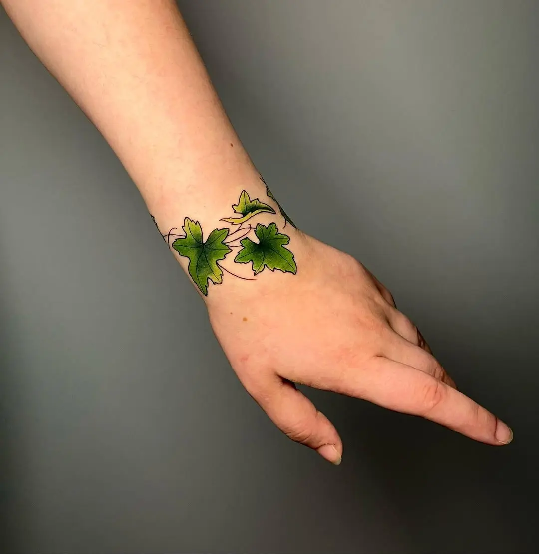 Elegant ivy tattoo encircling the wrist
