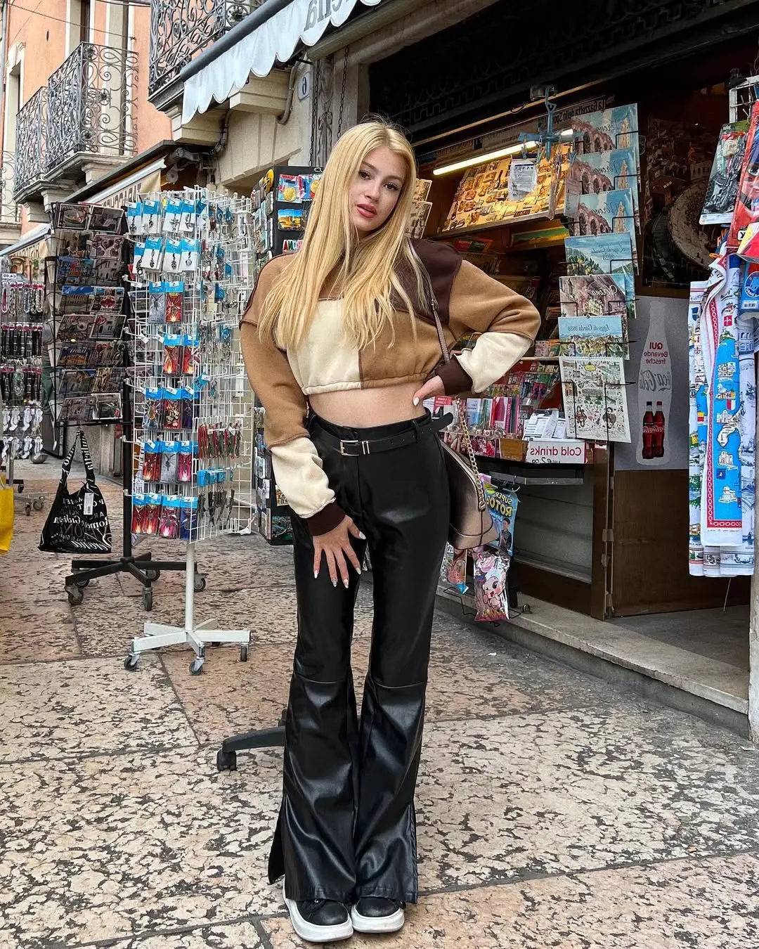 Trendy leather pants elevate casual street style