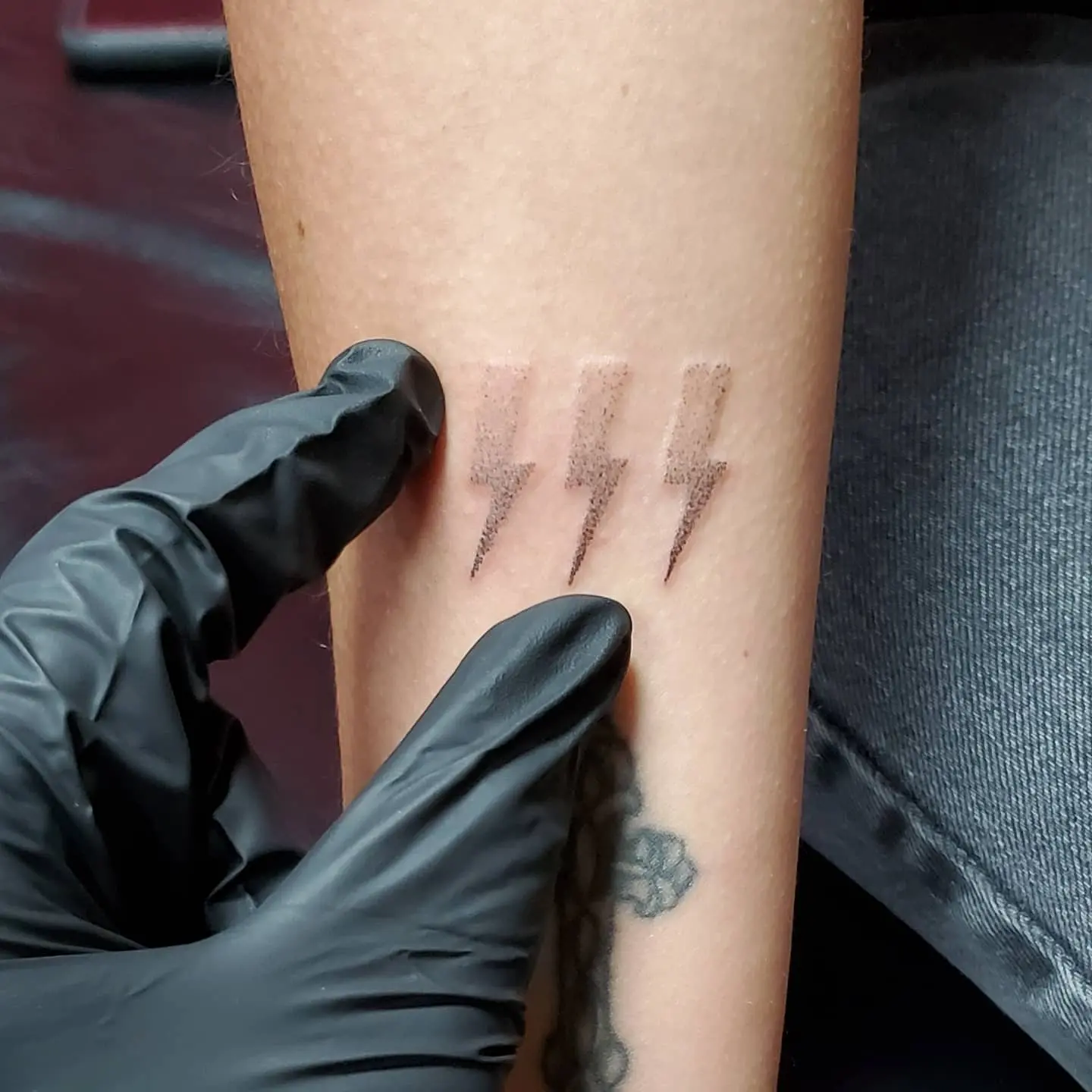 Stylish minimalist lightning bolt tattoo design