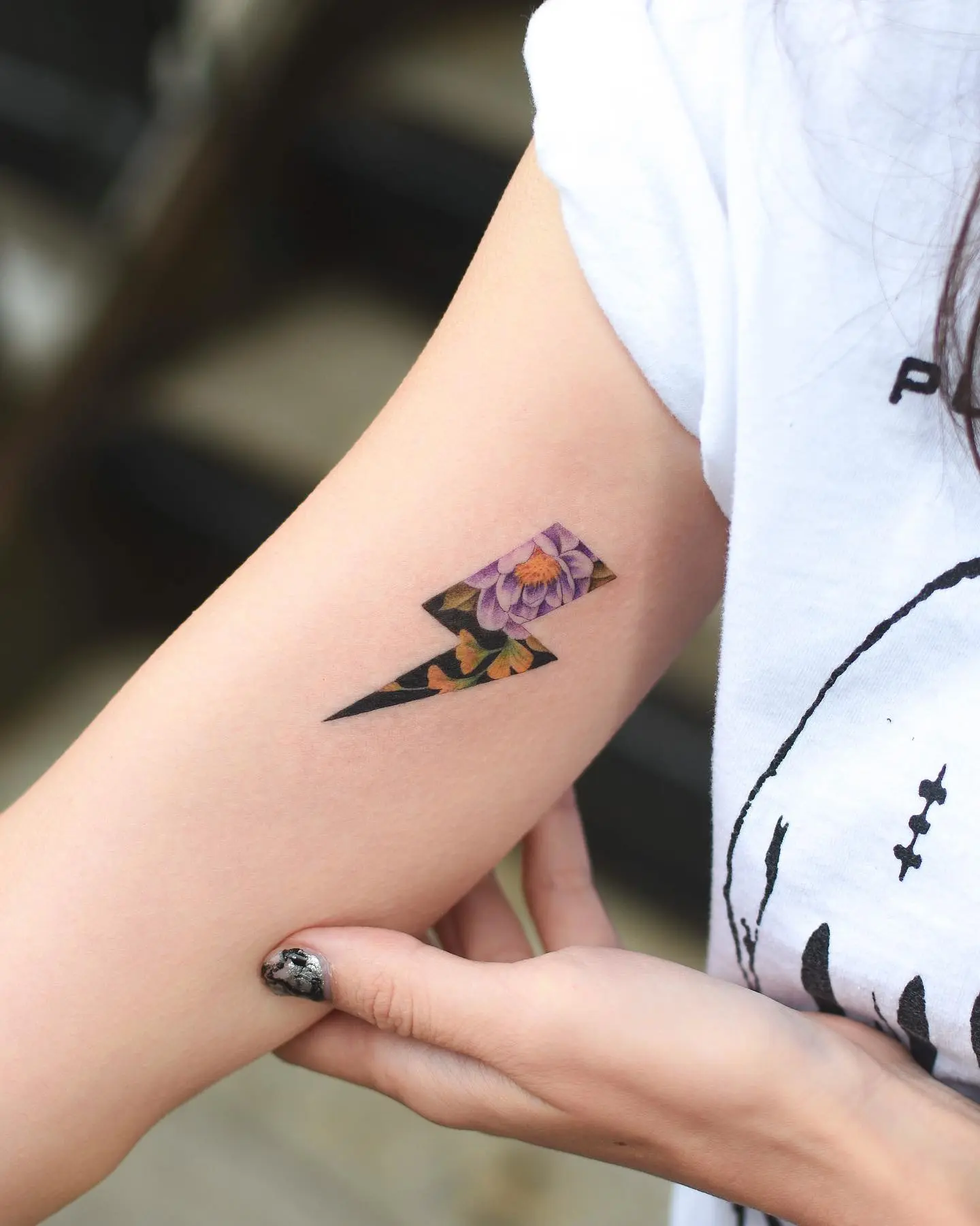 Colorful lightning bolt with floral theme