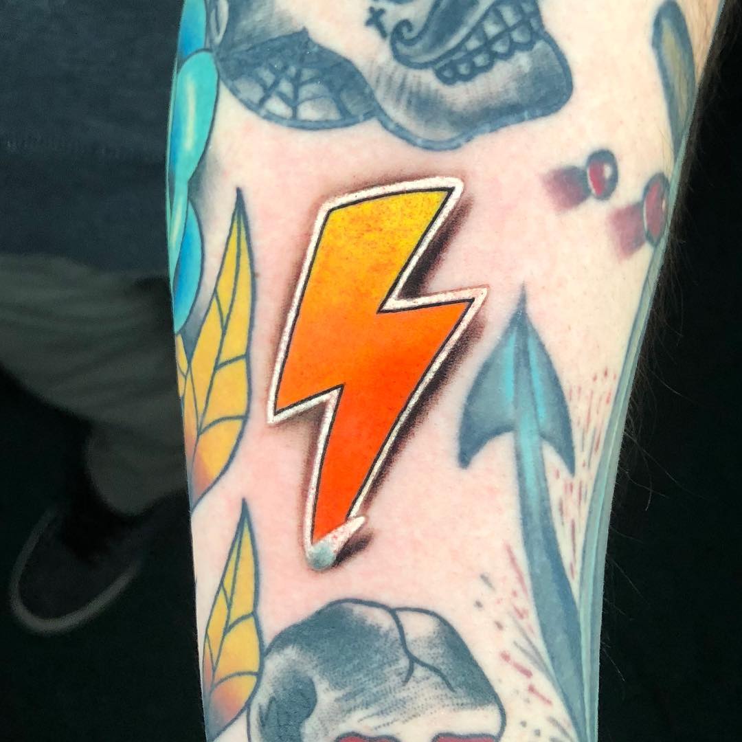 Striking lightning bolt tattoo with bold colors