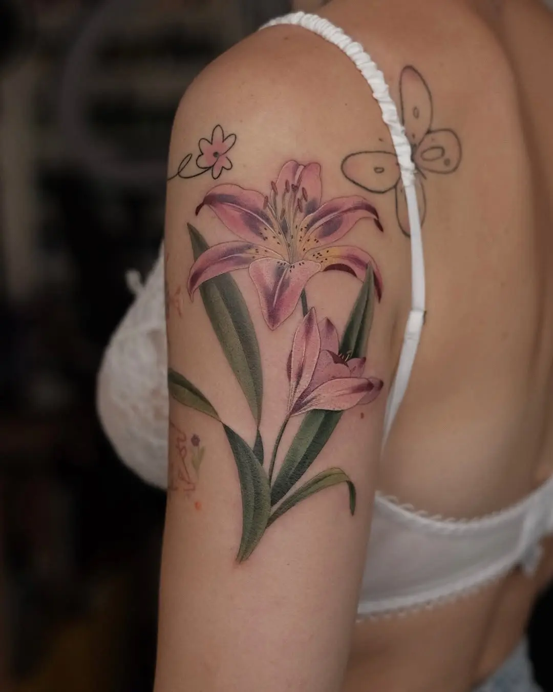 Elegant Lily Tattoo in Soft Pastel Colors