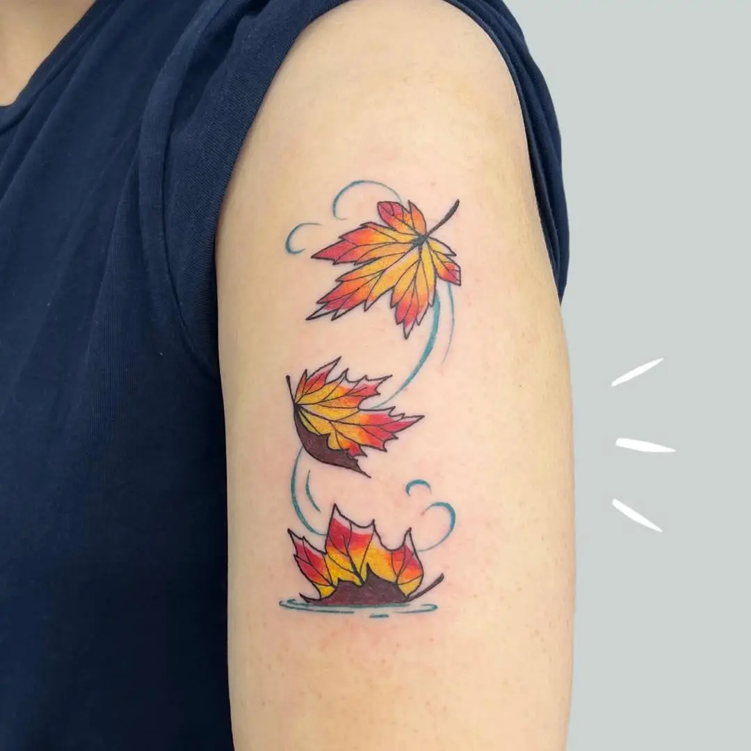 Whimsical maple leaf tattoo design in motion