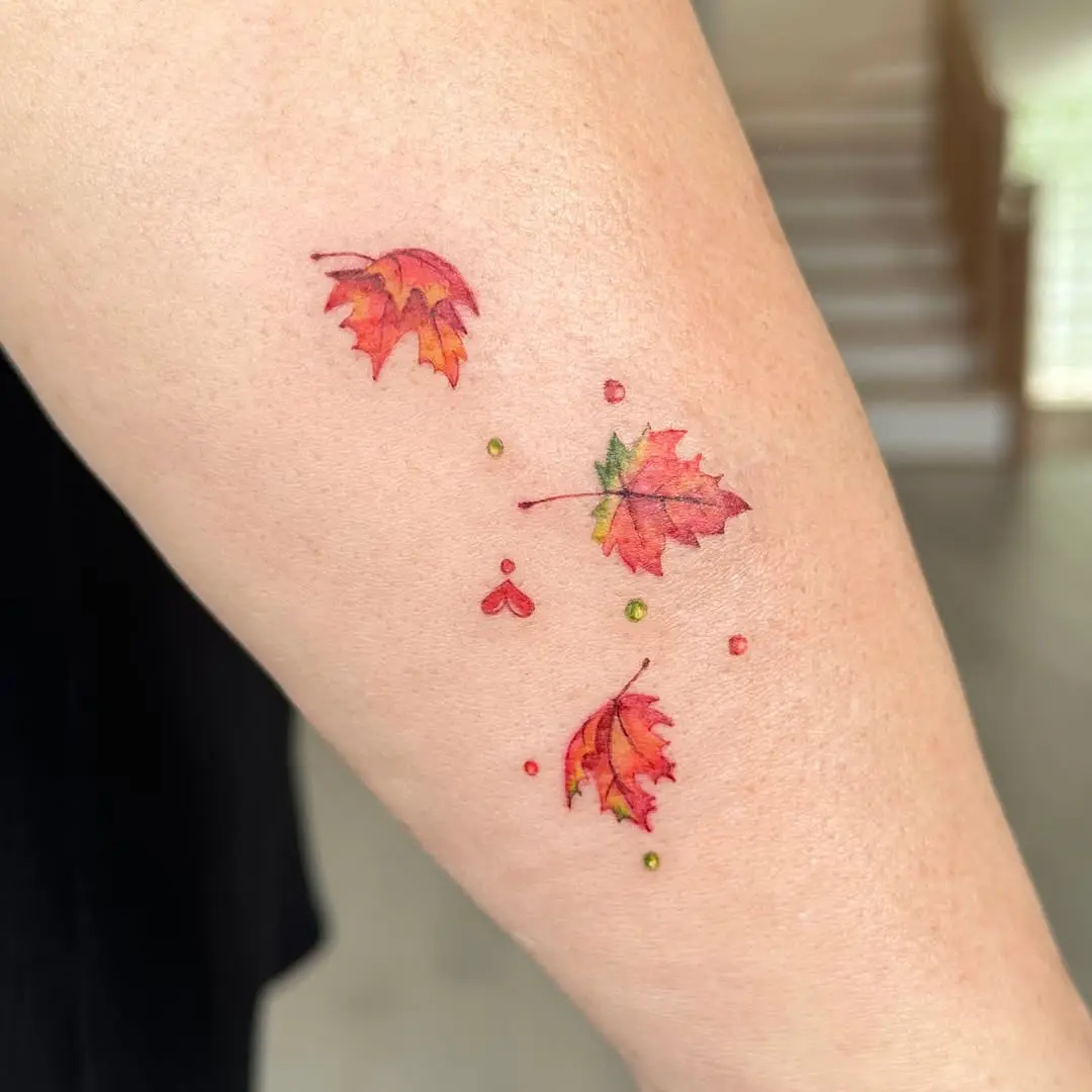 Charming maple leaf tattoos with vibrant colors