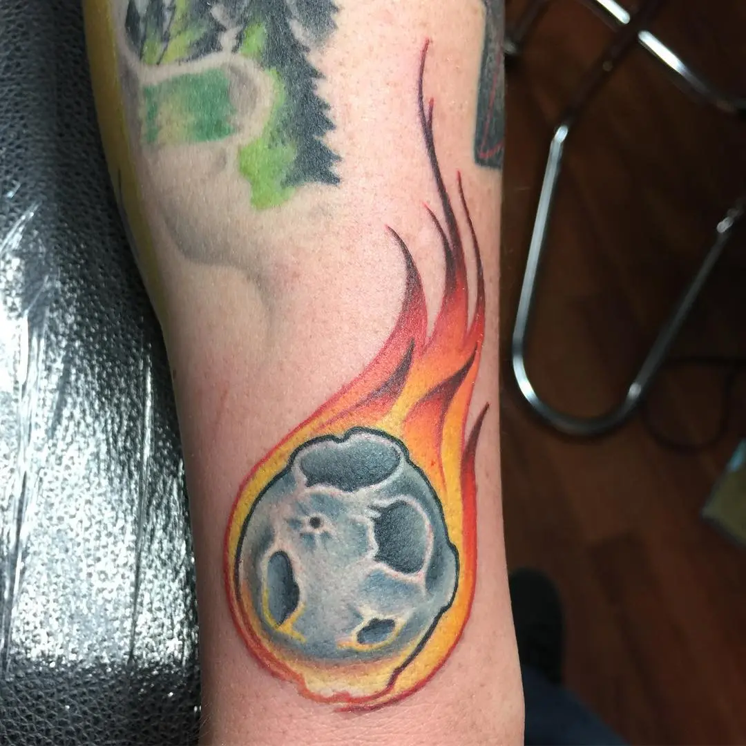 Stunning Meteor Tattoo with Fiery Flames