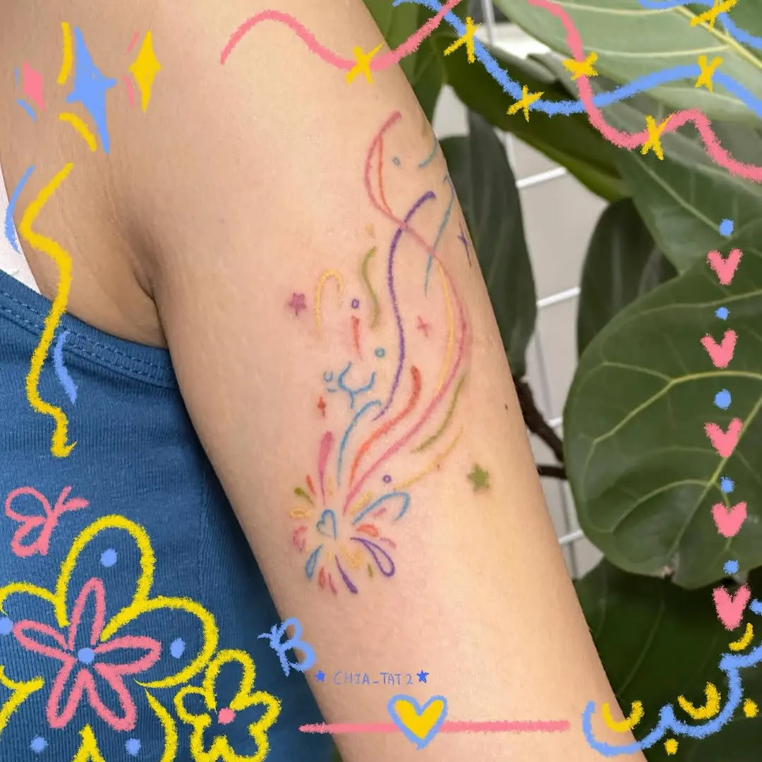 Colorful meteor tattoo with playful swirls