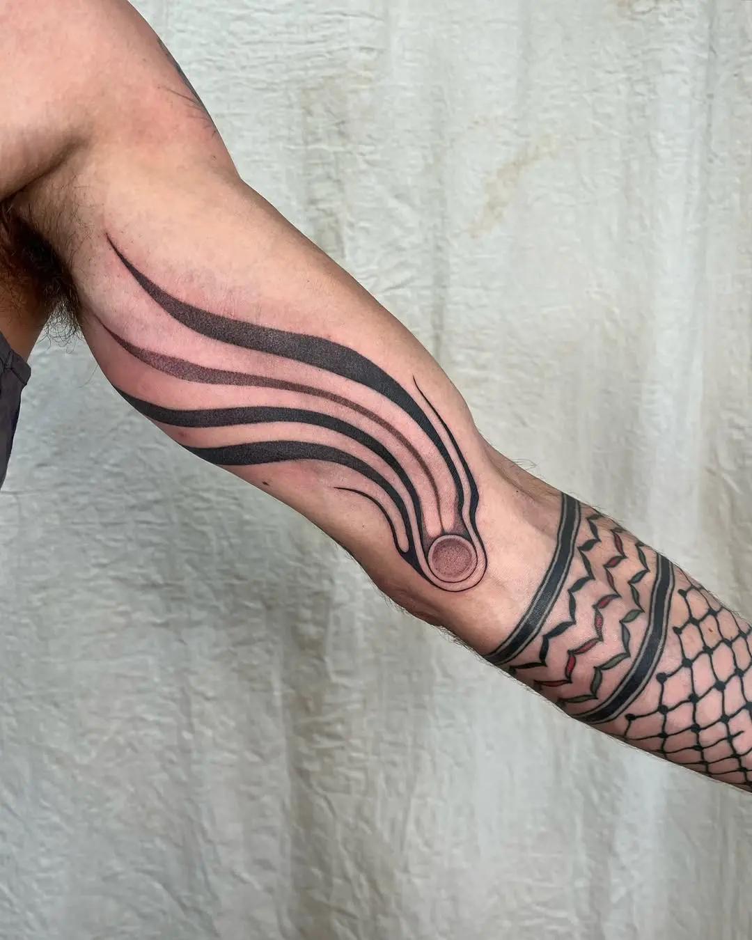 Minimalist Meteor Tattoo on Arm