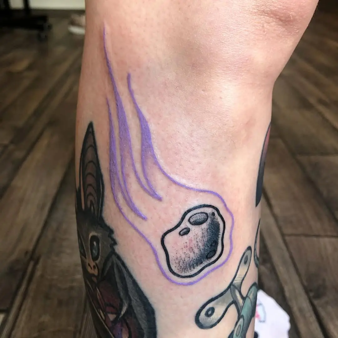 Whimsical Meteor Tattoo with Unique Details