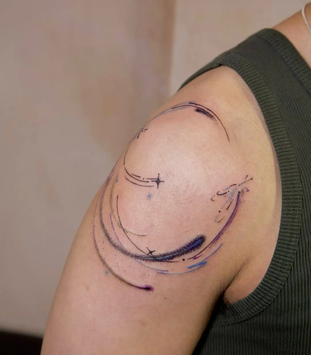 Stunning meteor tattoo with vibrant cosmic swirls