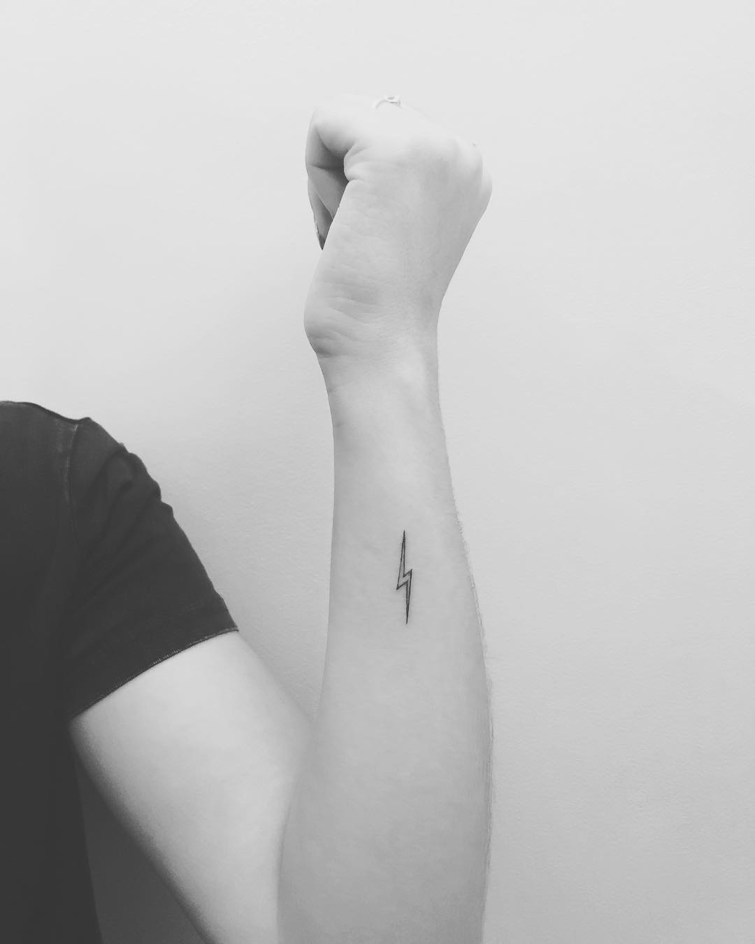 Simple yet striking lightning bolt tattoo design