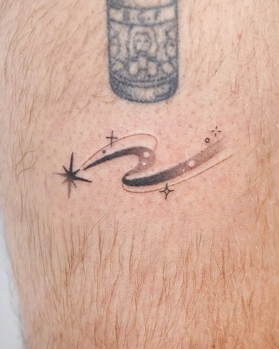 Stunning minimalist meteor tattoo design for fans