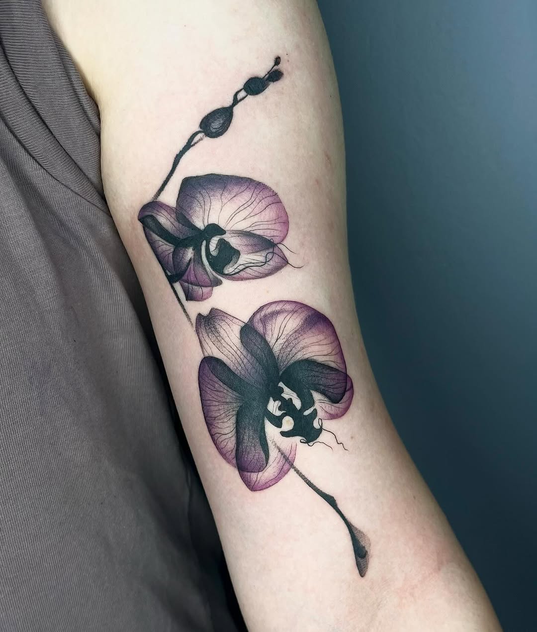 Elegant orchid tattoo with intricate details