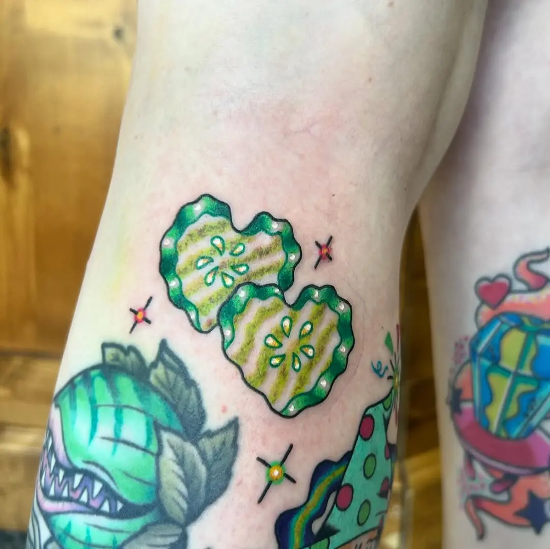Colorful Pickle Slice Tattoo on Skin