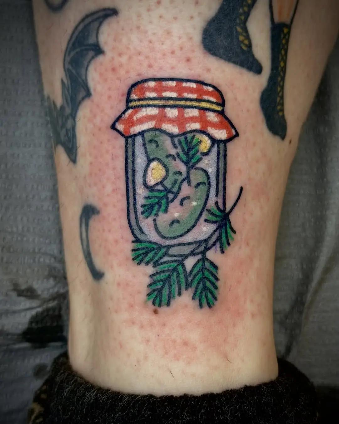 Adorable jar of pickles tattoo for enthusiasts