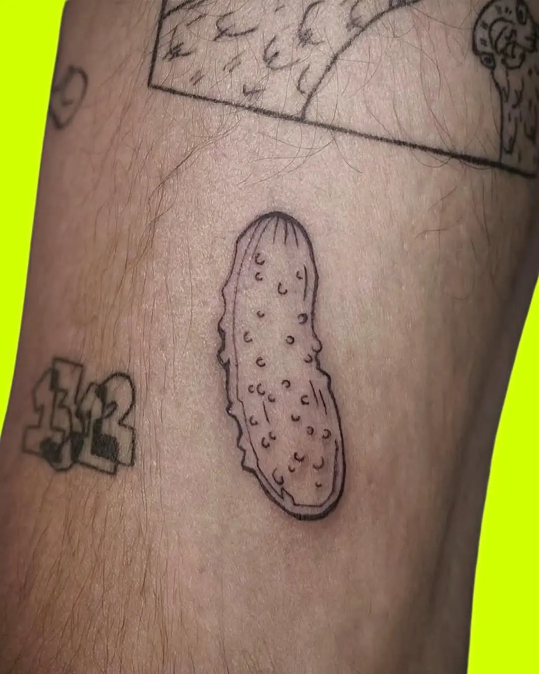 Quirky minimalist pickle tattoo design
