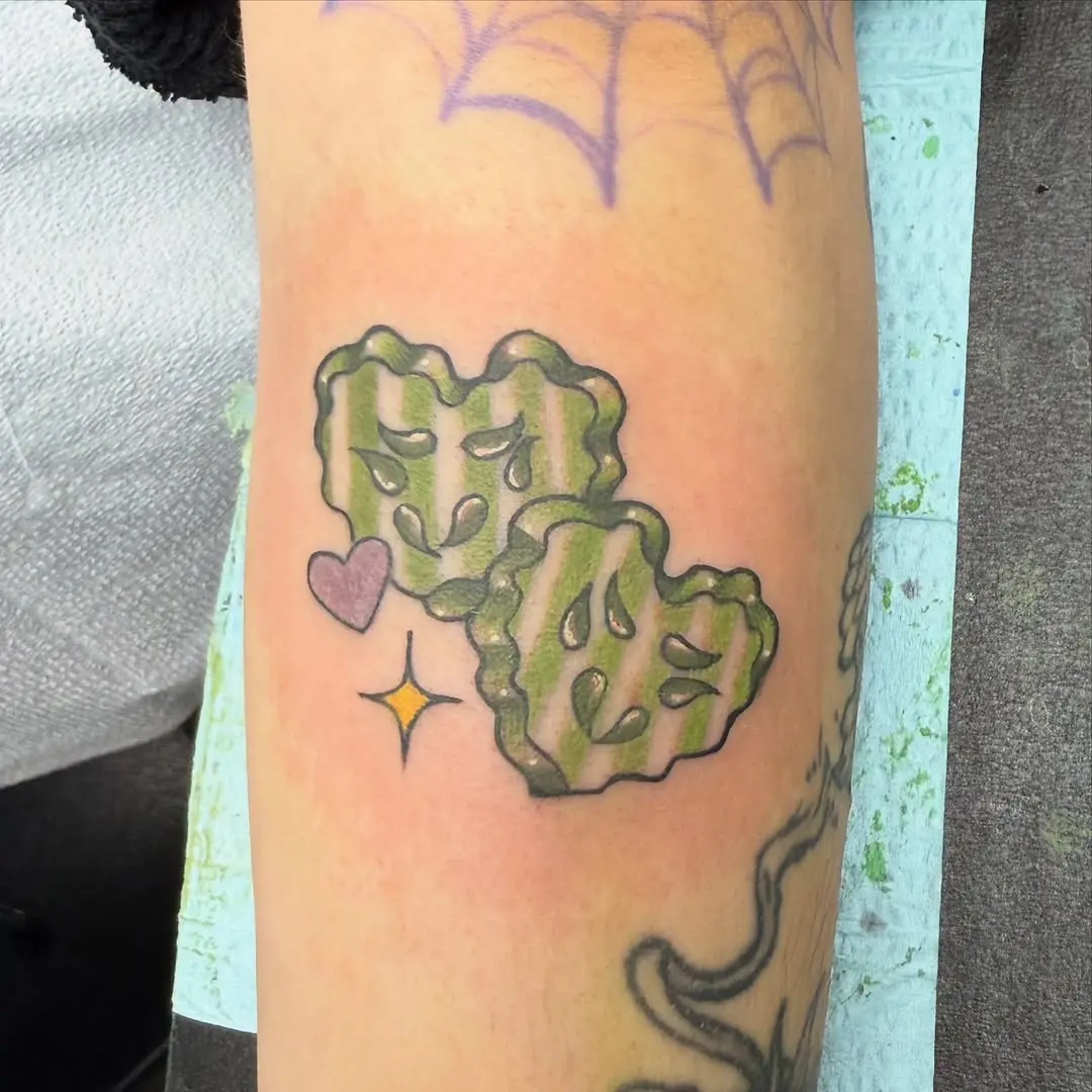 Charming heart-shaped pickle tattoos with sparkle