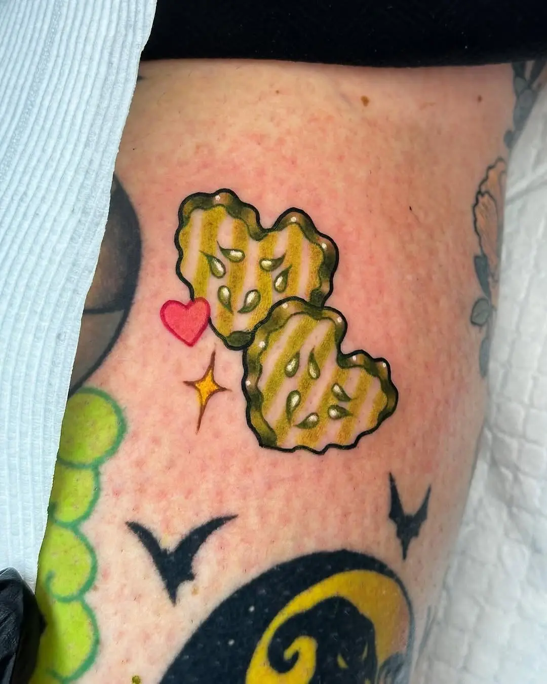 Cute and quirky pickle heart tattoo