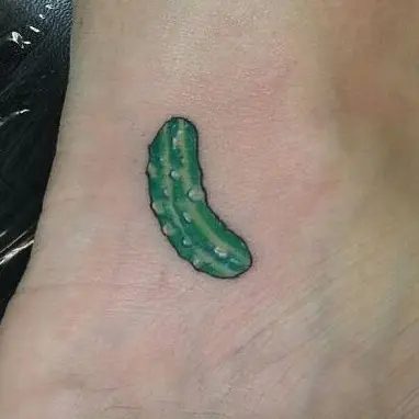 Whimsical pickle ankle tattoo design