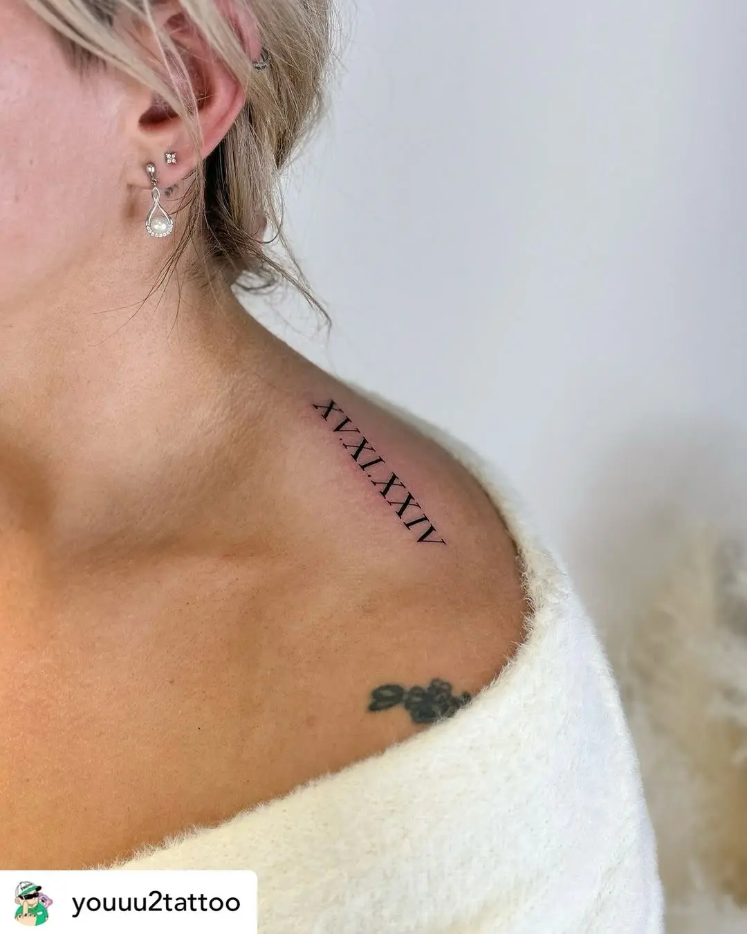 Elegant Roman Numerals on the Shoulder