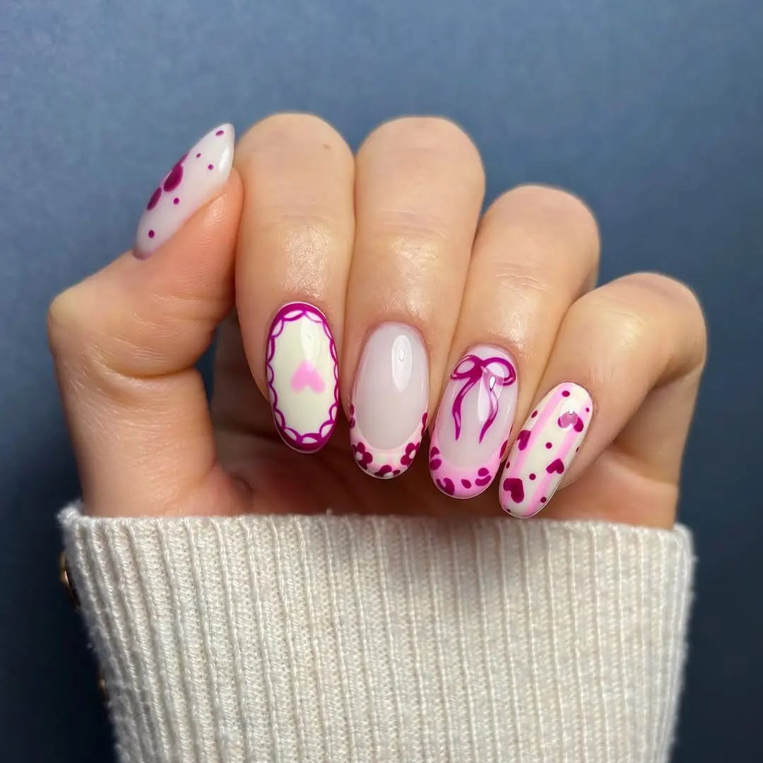 Charming Pink Nails with Hearts and Bows