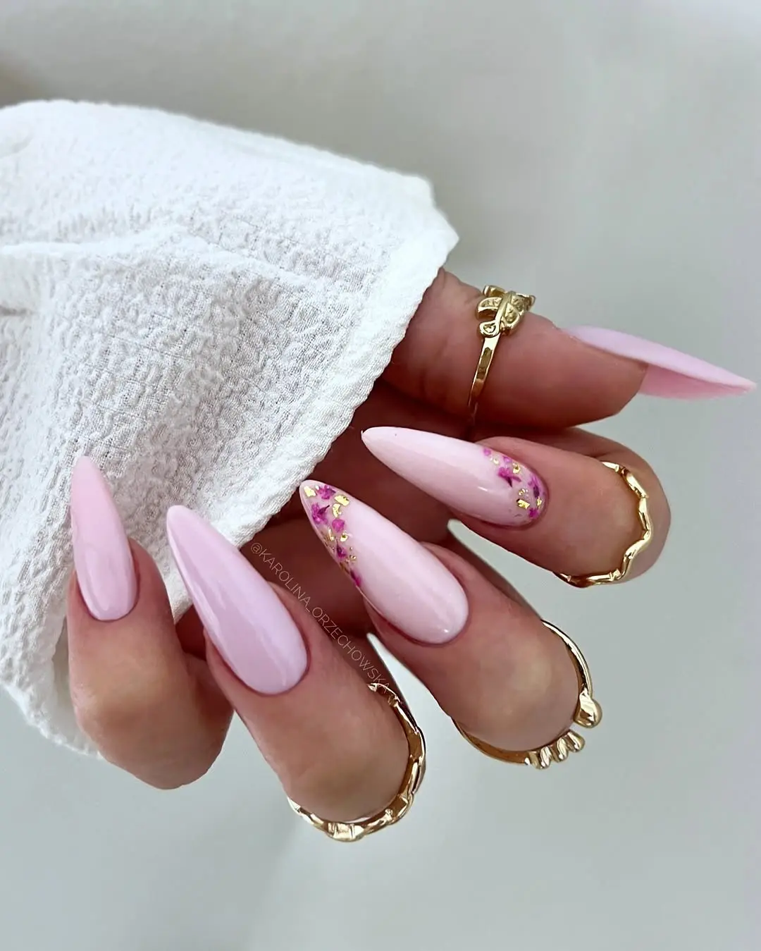 Gorgeous pink romantic nail design with charms