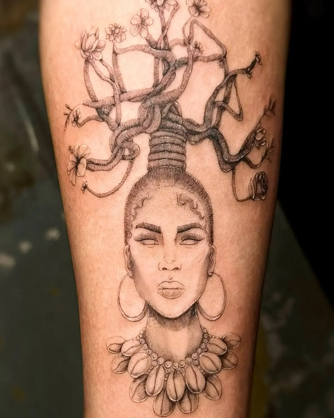 Expressive Roots Tattoo Blending Nature and Identity