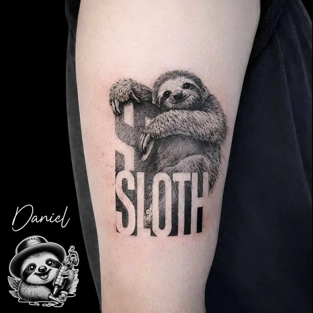 Charming sloth tattoo with bold lettering
