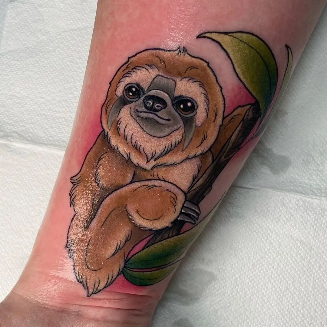 Adorable sloth tattoo with vibrant colors
