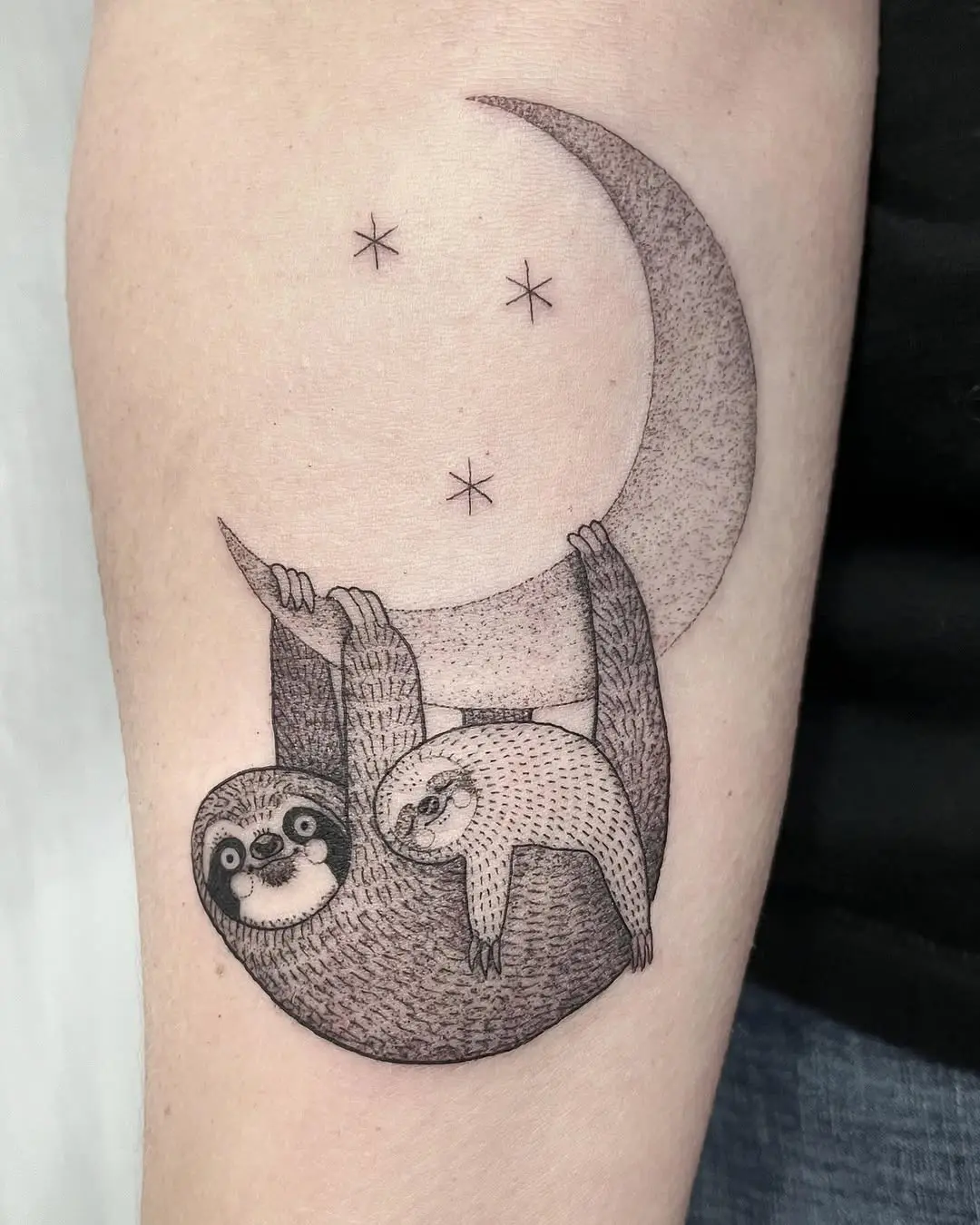 Charming sloth tattoo under a crescent moon