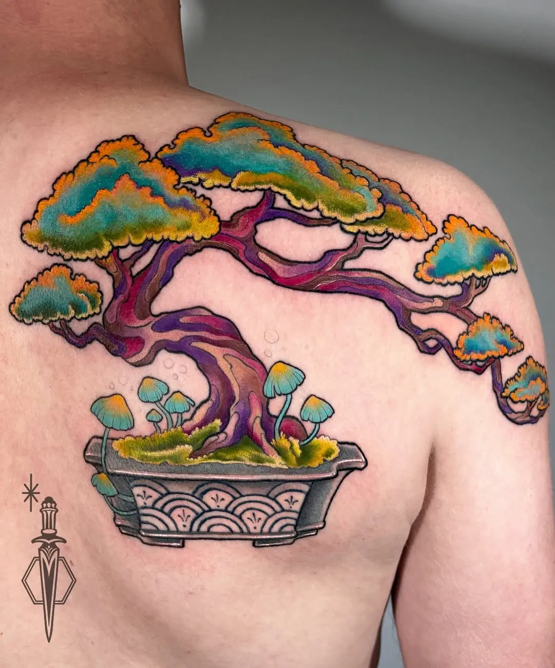 Vibrant bonsai tattoo showcasing intricate details