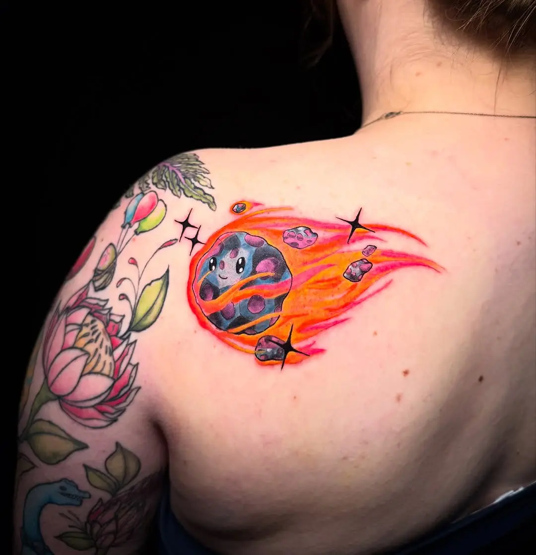 Colorful meteor tattoo with a playful vibe