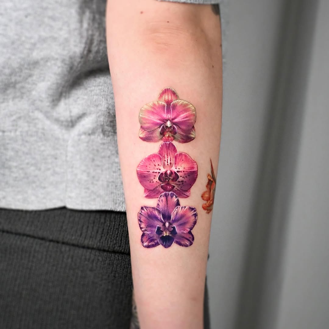 Vibrant orchid tattoo showcasing artistic elegance