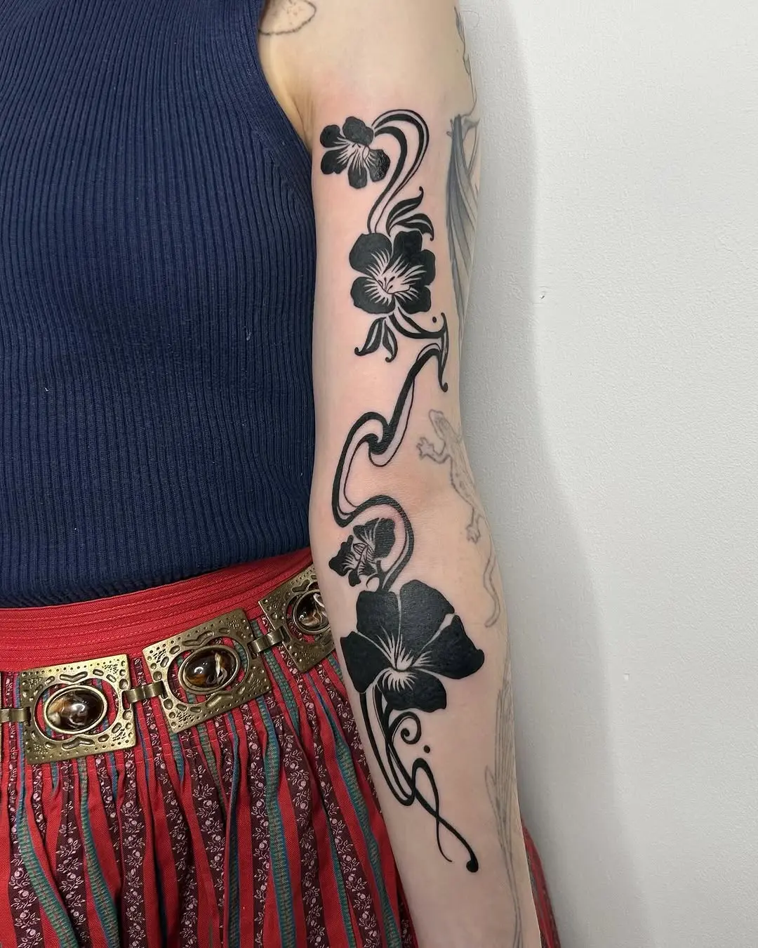 Elegant black floral art deco tattoo design