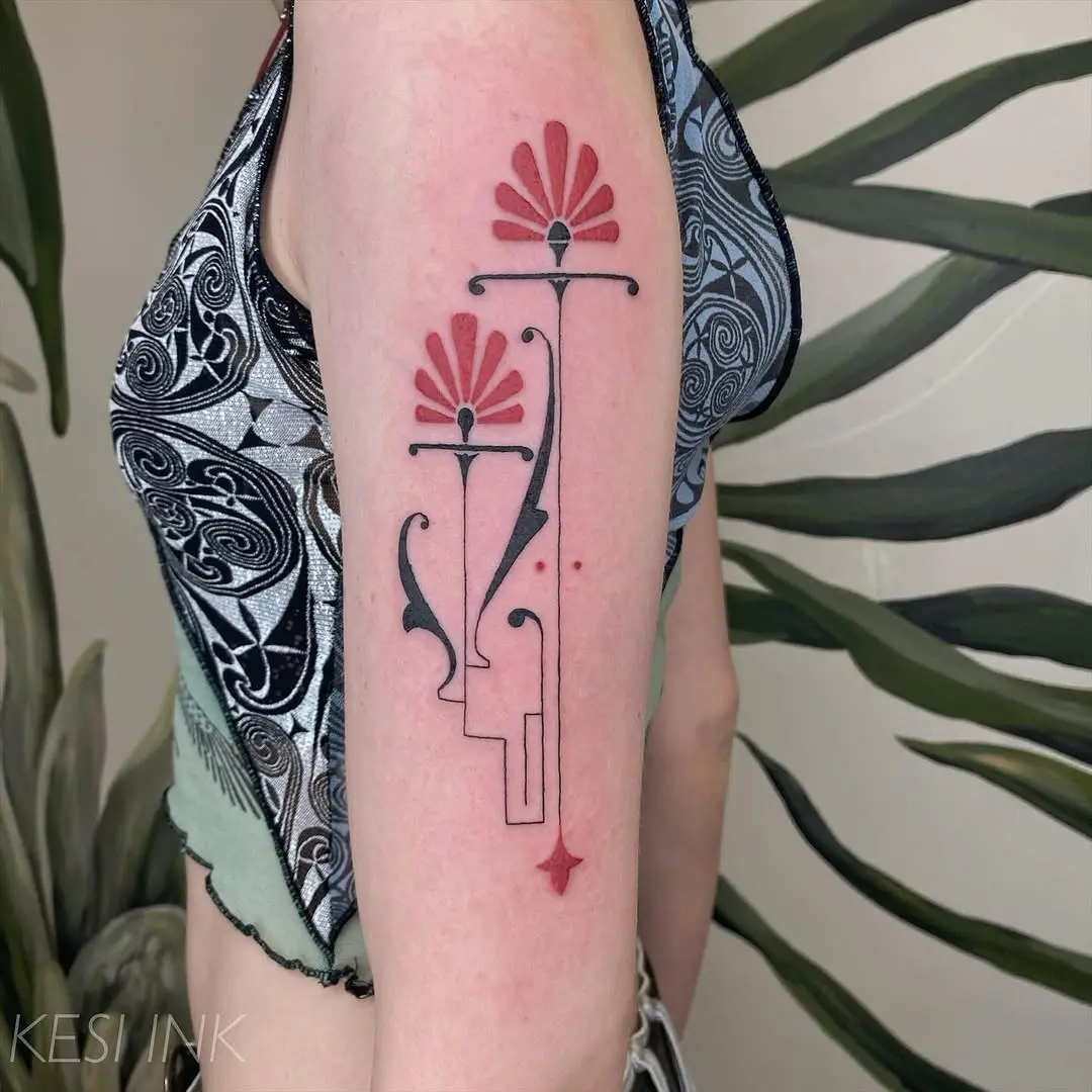 Elegant Art Deco Tattoo with Floral Elements