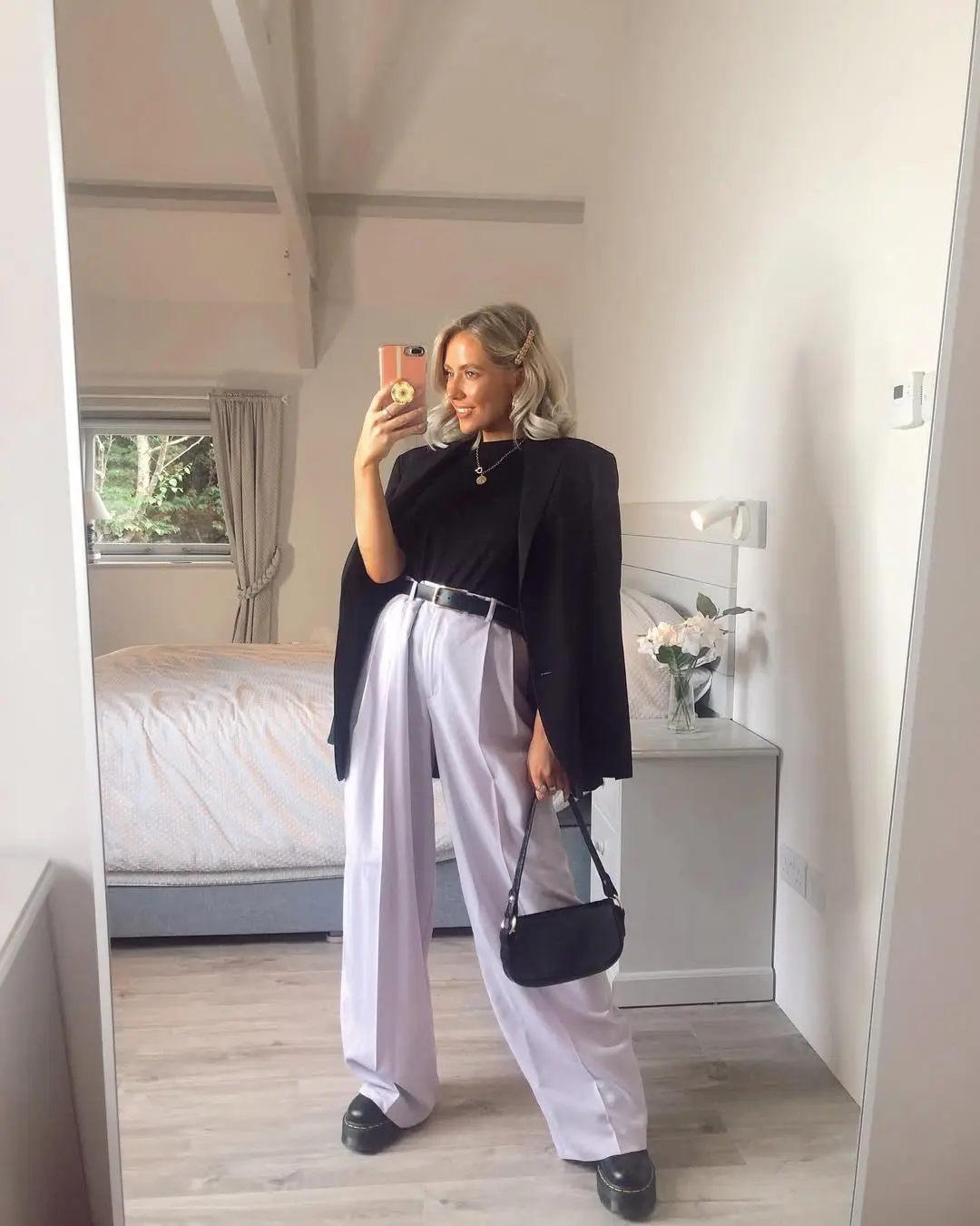 Chic black blazer with stylish palazzo pants