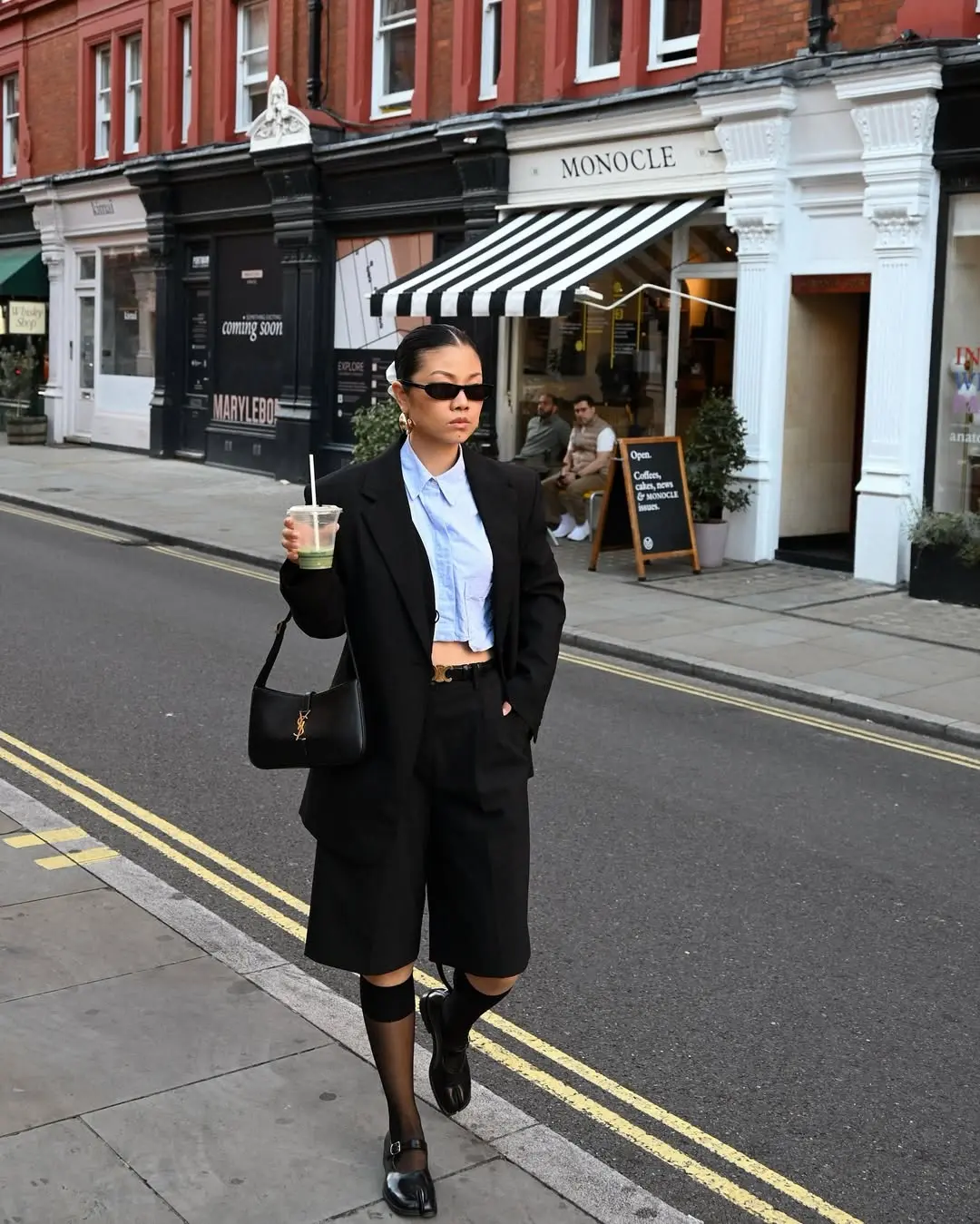 Chic black blazer with trendy streetwear vibes