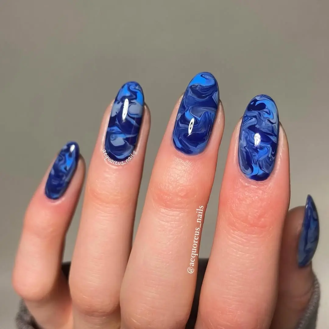 Stunning periwinkle marble nail art design