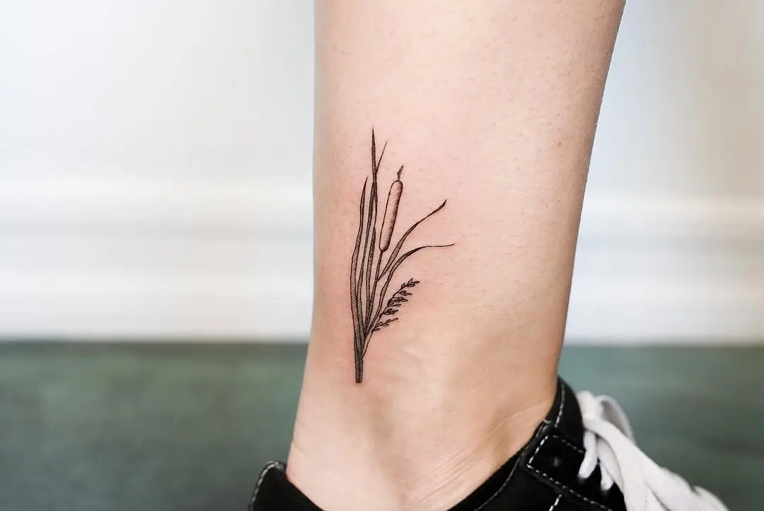 Elegant cattail tattoo on the ankle