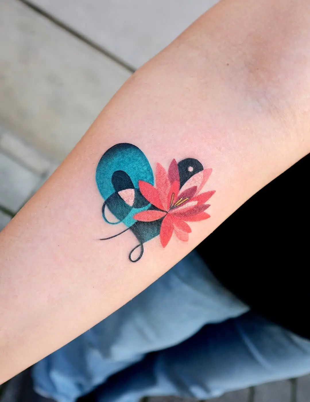 Bold Water Lily Ink Design on the Arm