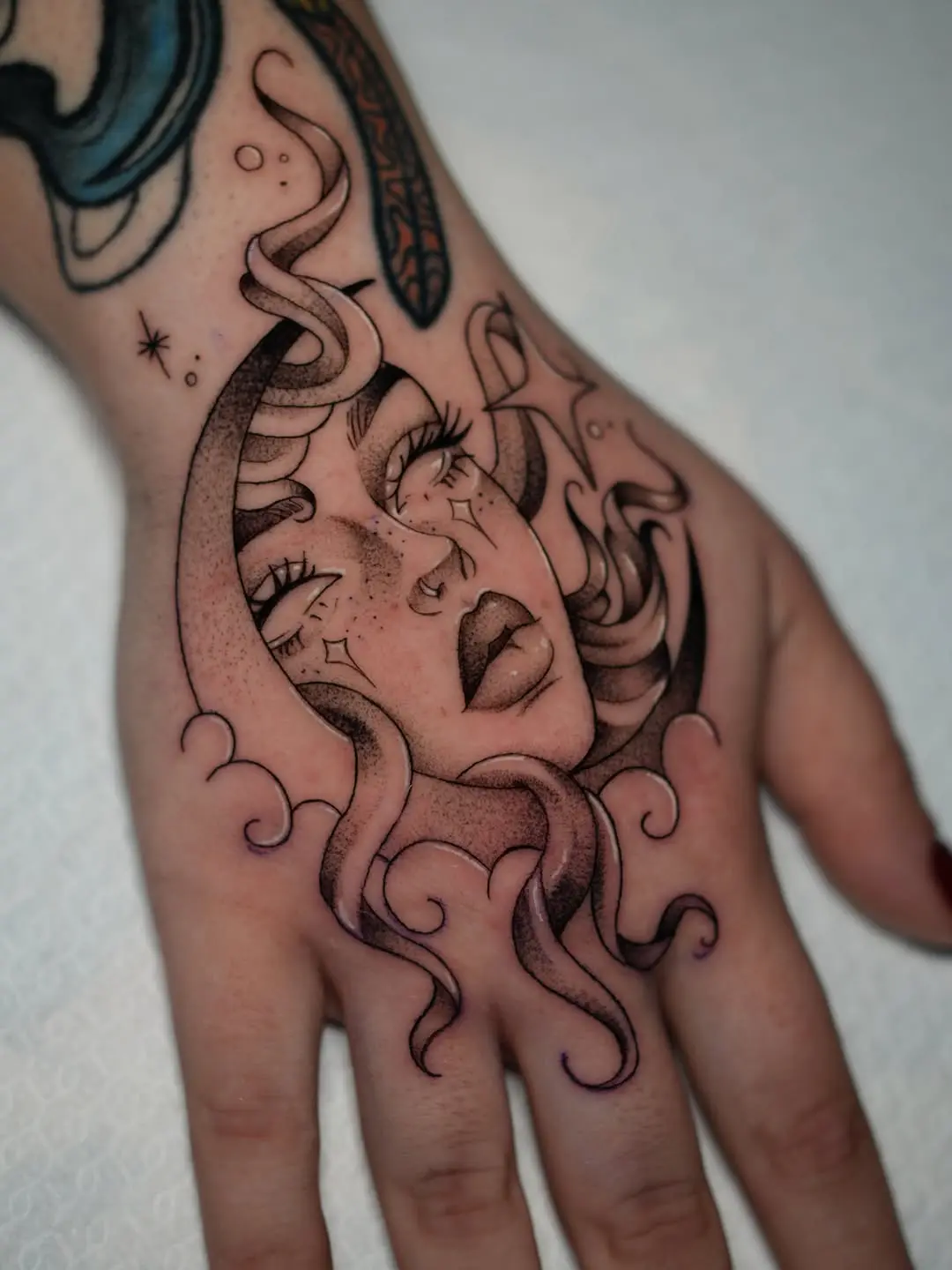 A Unique Crescent Moon Tattoo Design