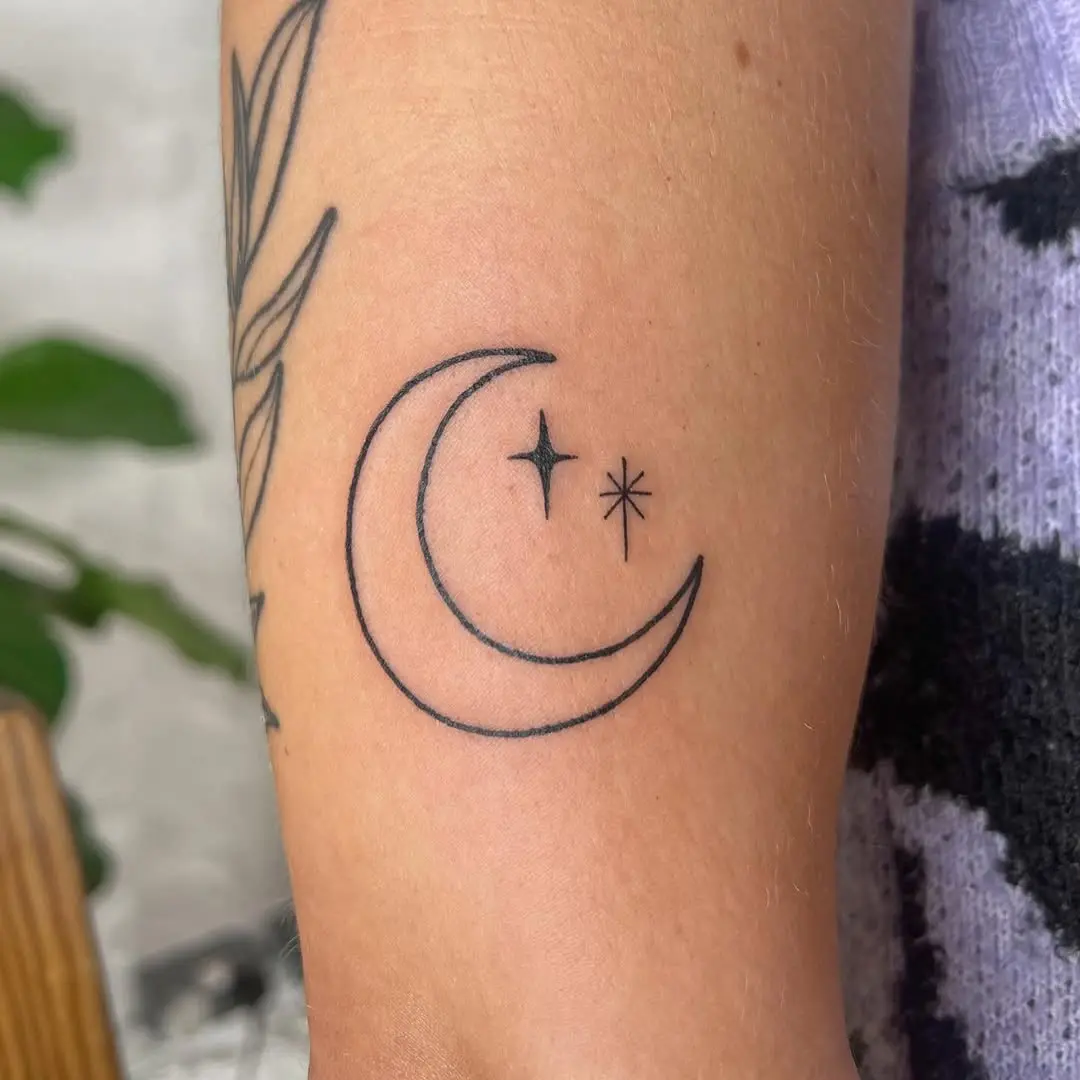 Elegant crescent moon with twinkling stars