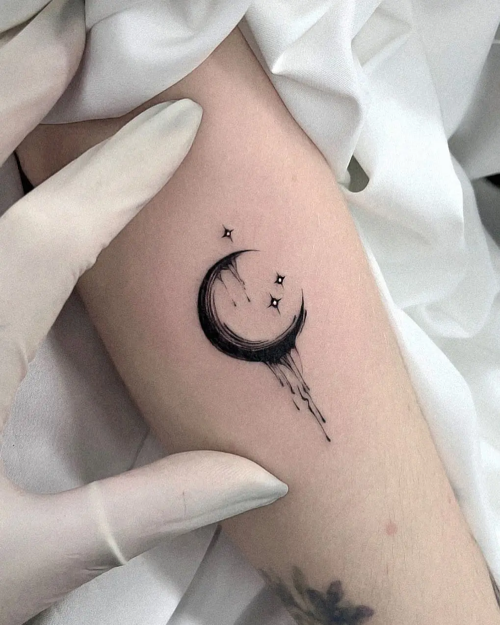 Delicate Crescent Moon with Whimsical Stars