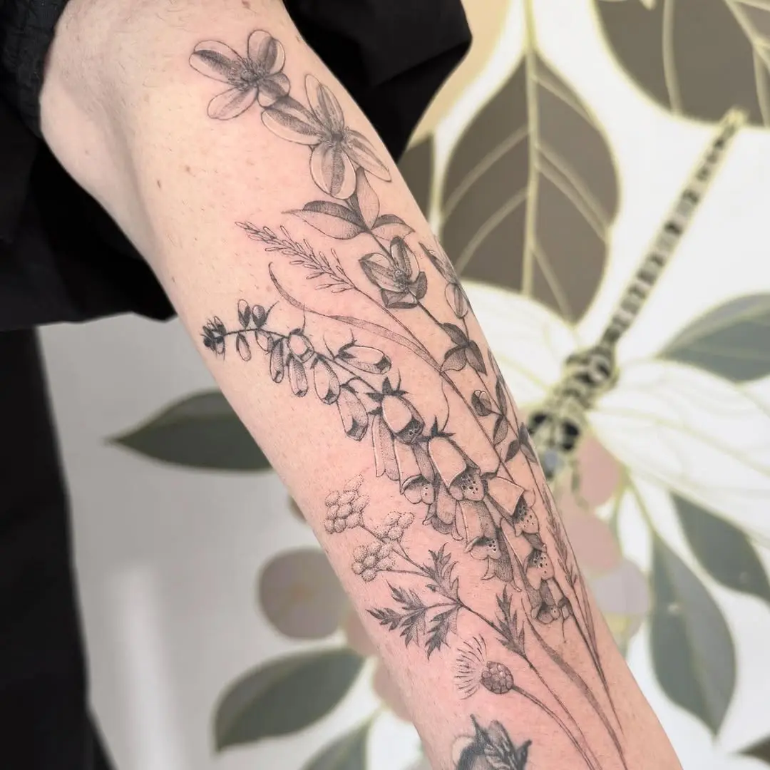 Elegant wildflower tattoo showcasing intricate details